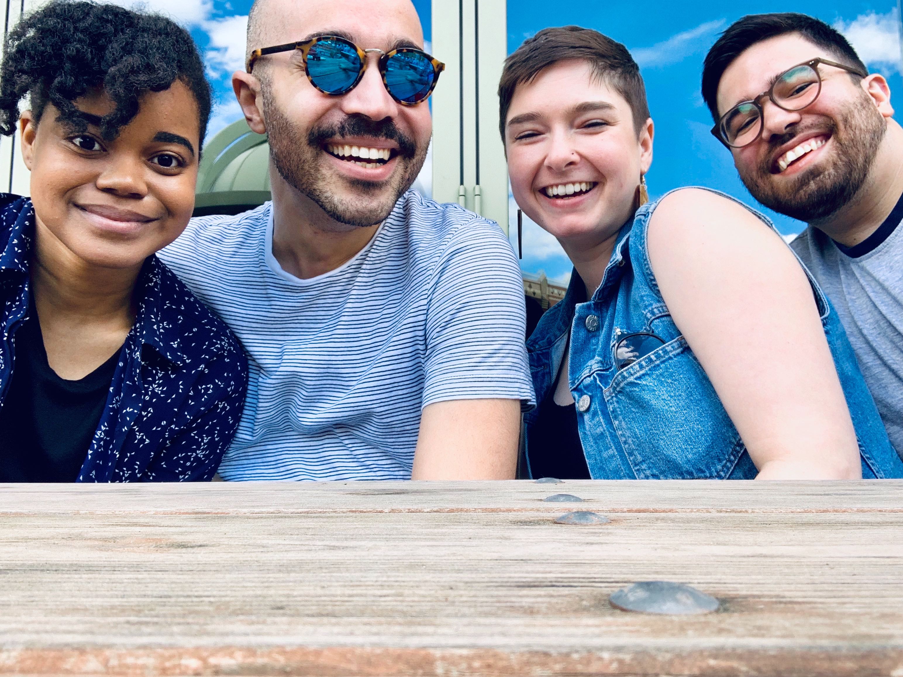 Brittany, Devon, Nathan and Rebecca posting for an image at a Boardgame event